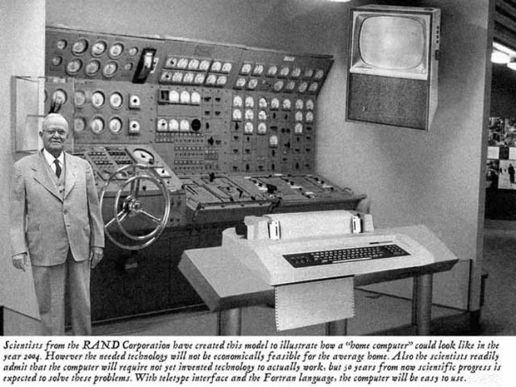 Man standing next to 1954 Home Computer 