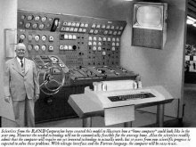 Man standing next to 1954 Home Computer 
